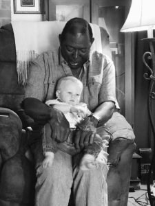 Black Man Holds White Baby, Close Look Tells State Of ‘Race Relations’