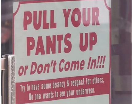 Backlash to a “offensive” sign in the window of an Oklahoma liquor business