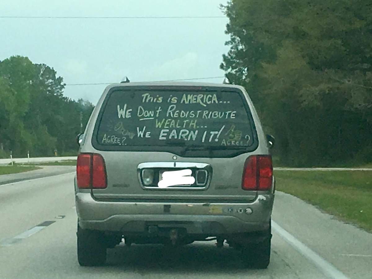 A “controversial” message on the back of an SUV sparks discussion online