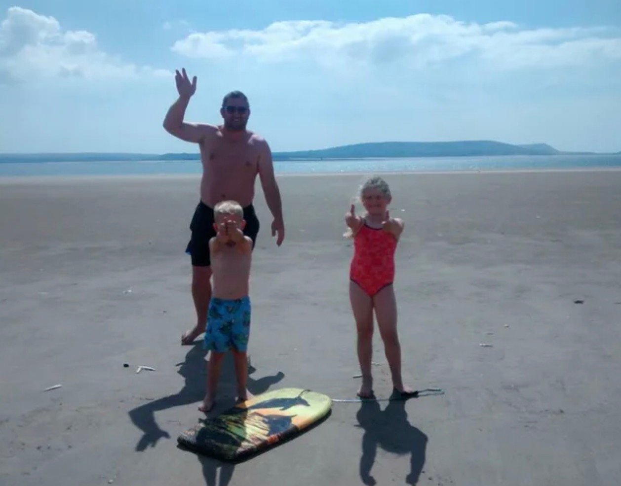 Father’s Beach Photo of Son Goes Viral – Authorities Take Swift Action After Noticing Tiny Detail!