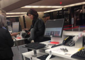 A sweet scene at the airline counter goes viral! Look more closely, and you’ll see why.