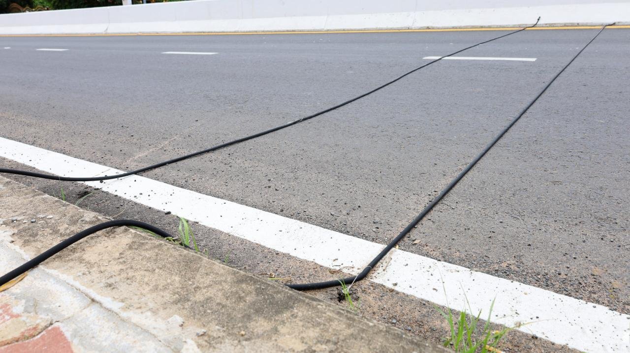 Here’s what those mysterious black cables on the road mean