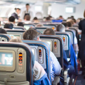 Surprising reason flight attendants sit on their hands