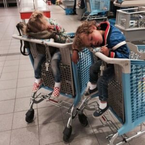 MOM COLLAPSES NEXT TO SLEEPING KIDS IN SHOPPING CART… MOM COLLAPSES NEXT TO SLEEPING KIDS IN SHOPPING CART…